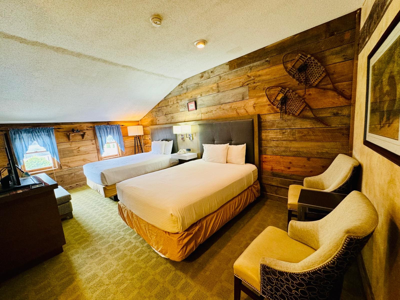 Double Queen Rooms at Merrill Farm Inn — Modern comfort with rustic character